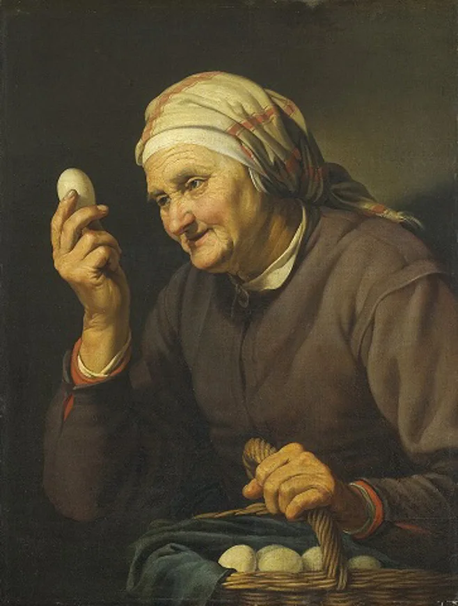 woman gazing upon an egg woman gazing upon an egg